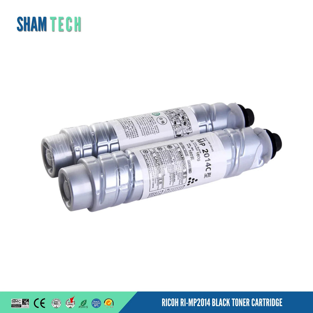 Two silver toner bottles rest horizontally, stacked slightly staggered without their box against a white background. Each bottle features a ribbed cylindrical body, a black cap on the right end, and a white label around the center printed with product details, warning icons, and the text "MP 2014C 型", and a bottom banner displays various compliance and certification logos alongside the text "RICOH RI-MP2014 BLACK TONER CARTRIDGE".