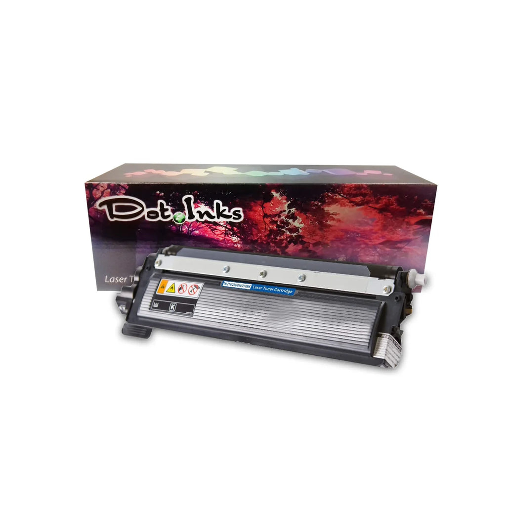 A black Dot Inks laser toner cartridge (model TN-210/230/240/270BK) displayed in front of its retail packaging box. The cartridge features a silver-ribbed roller assembly and warning symbols on its side, while the box behind it showcases a vibrant red-and-purple forest canopy graphic under a rainbow-colored header with the Dot Inks logo.
